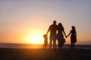 family on beach, Florida family, sunset, silhouette